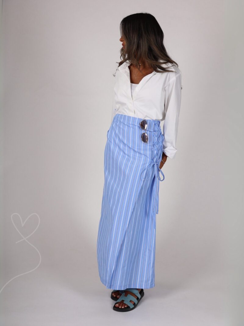White shirt with wrapped skirt